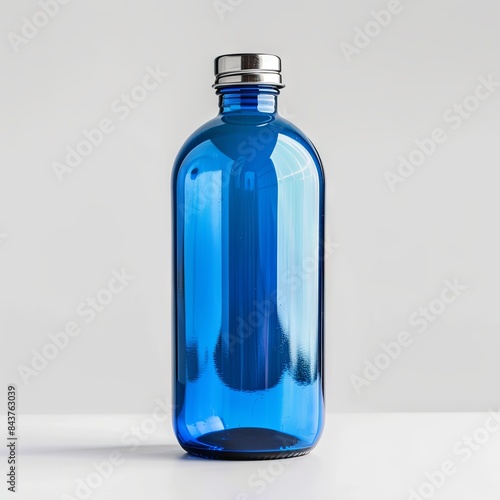 Isolated blue water bottle on white background