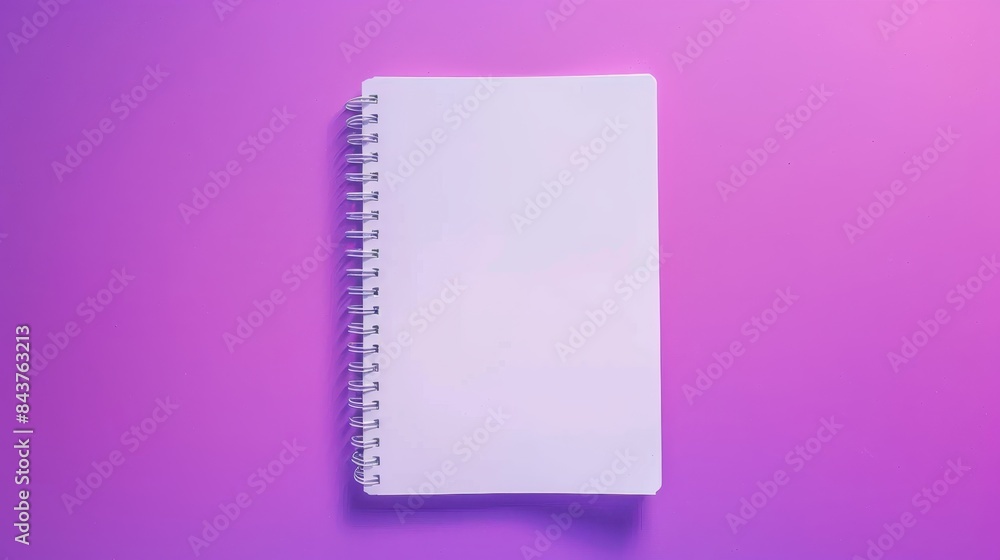 White spiral-bound notebook placed upright against a gradient background that transitions from purple at the top to pink at the bottom White spiral-bound notebook placed upright against a gradient background that transitions from purple at the top to pink at the bottom