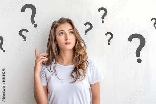 Confused Woman with Question Marks - Thinking Concept, Decision Making, Problem Solving, Brainstorming Ideas, Uncertainty, Doubtful Expression, Pondering Thoughts, Mental Challenge, Curiosity