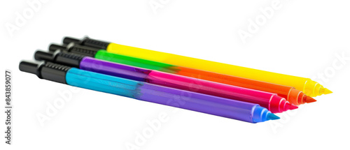 Assortment of colorful pens on a black background.