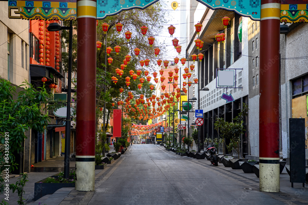 Naklejka premium Street decorated with paper lanterns. Chinatown, Mexico City