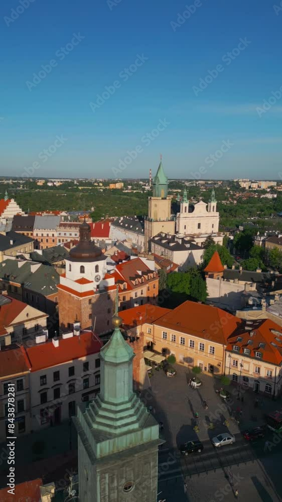 colorful sunny summer at European old town Lublin, beautiful sunset over roof at ancient Poland district, Europe 4k, vertical video footage colorful sunny summer at European old town Lublin, beautiful sunset over roof at ancient Poland district, Europe 4k, vertical video footage