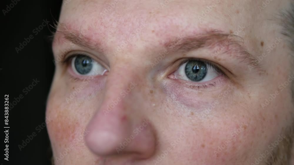 Open your eyes close-up. The look of a young man. Beautiful gray human eyes close up. Open your eyes close-up. The look of a young man. Beautiful gray human eyes close up.