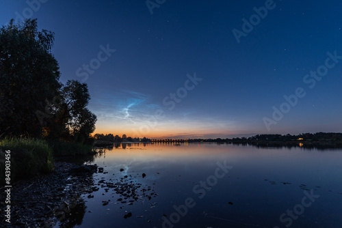 Noctilucent clouds over the Daugava river in Latvia on June night