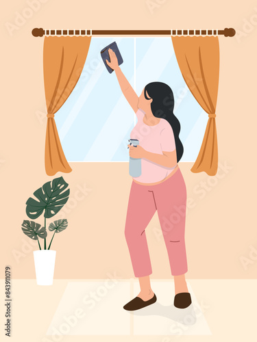 Pregnant women doing housework , Wipe the window glass