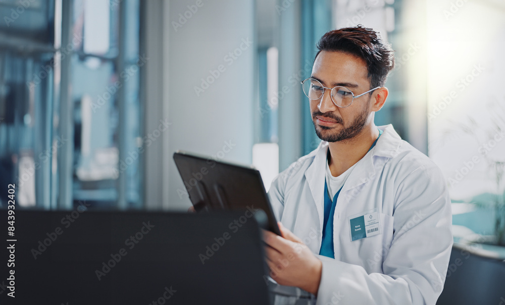 Doctor, man and tablet with results consultation, internet and tech in hospital with surgery planning. Healthcare, wellness and online clinic consultant with working and research for medical support Doctor, man and tablet with results consultation, internet and tech in hospital with surgery planning. Healthcare, wellness and online clinic consultant with working and research for medical support