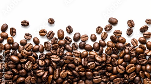 Close Up of Roasted Coffee Beans Scattered on White Background