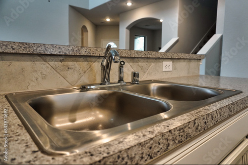 Fotografija This is a close up picture of the kitchen sink that was installed in a newly constructed home