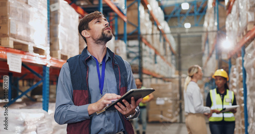 Fotografie Logistics, distribution and man with tablet in warehouse for stock inspection, inventory check or freight shipping