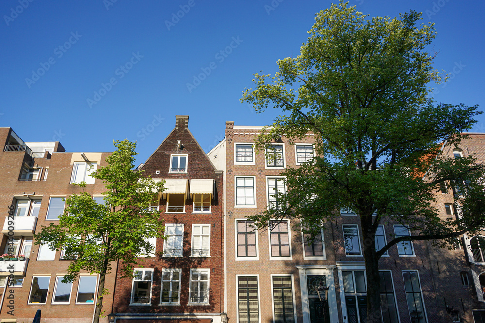 Low angle view of buildings against sky Low angle view of buildings against sky