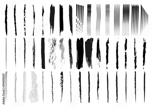 Trazos verticales negros de diferentes tipos de pinceles.