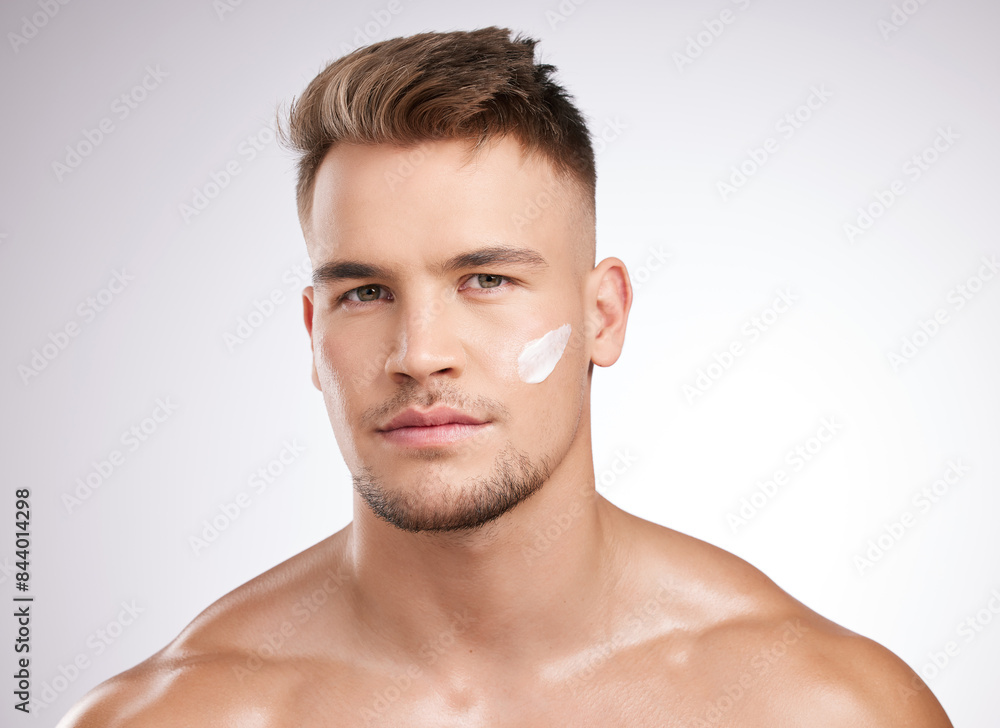 Skincare, portrait and man in studio with cream for moisturizer, grooming or morning routine on white background. Body, wellness and model with confidence for lotion, cosmetics or satisfaction Skincare, portrait and man in studio with cream for moisturizer, grooming or morning routine on white background. Body, wellness and model with confidence for lotion, cosmetics or satisfaction
