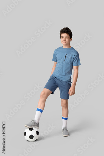 Teenage boy playing with so...