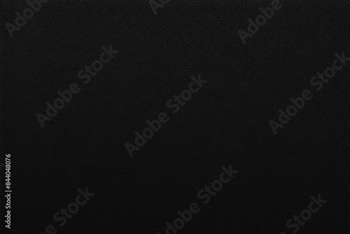 Finely grained, matte black synthetic fabric texture