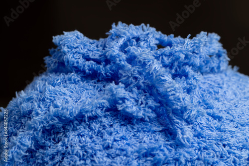 new soft blue threads with traces of other threads close-up