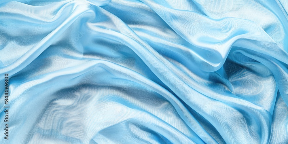 A close-up shot of a light blue fabric with intricate patterns and textures A close-up shot of a light blue fabric with intricate patterns and textures