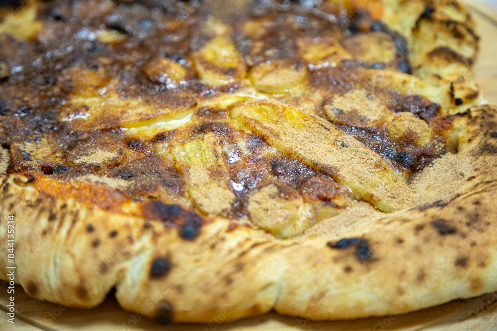Traditional sweet Brazilian banana pizza with cinnamon, chocolate and catupiry Traditional sweet Brazilian banana pizza with cinnamon, chocolate and catupiry