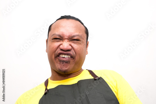 portrait of ugly or mocking male facial expression isolated on white background photo