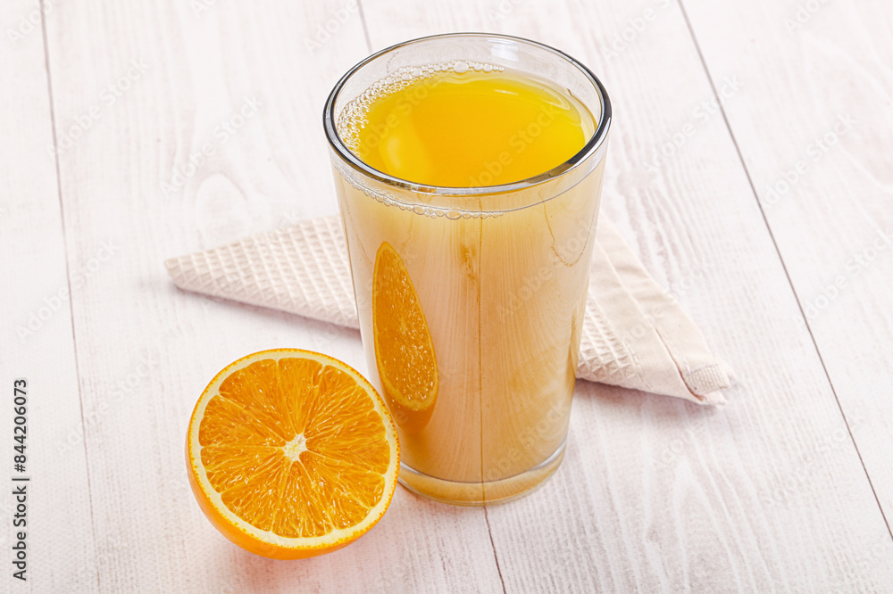 Sweet fresh orange juice in the glass Sweet fresh orange juice in the glass