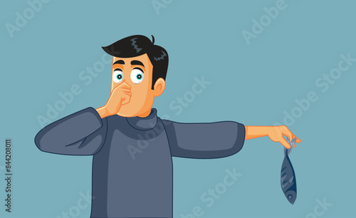 Funny Man Holding Stinky Fish Vector Cartoon Illustration. Fisherman catching a bad smelling fish Covering his nose 
