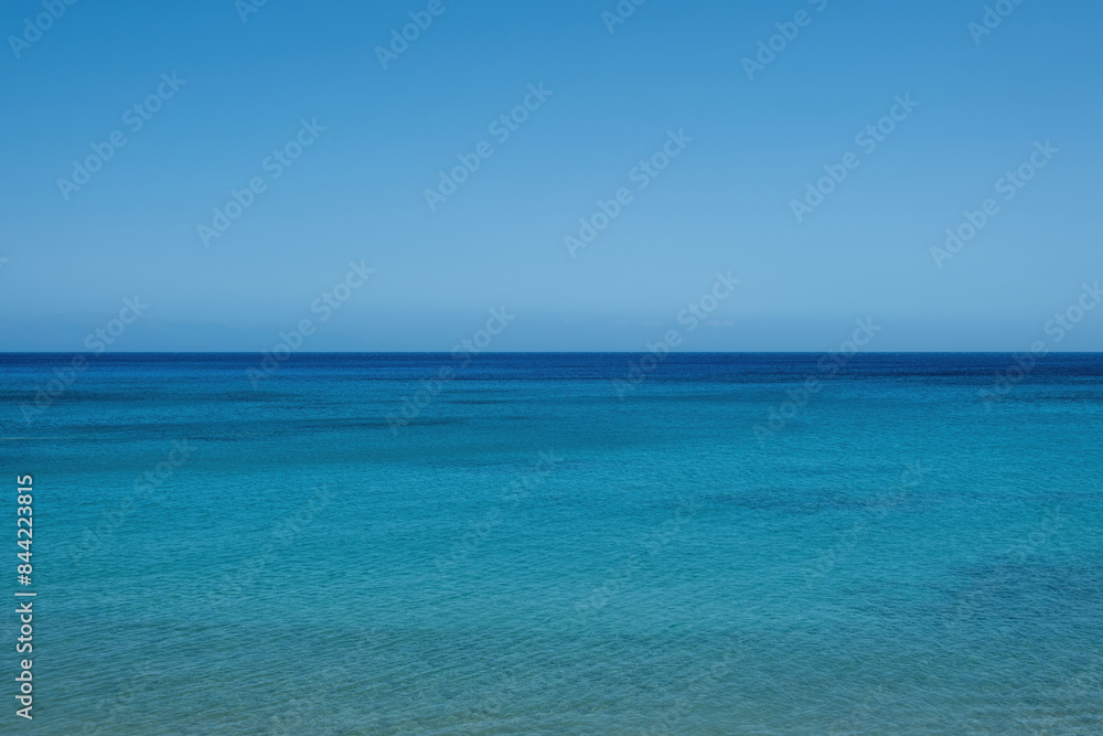 Ripple sea joins with blue sky background texture. Empty clear sea water surface. Copy space Ripple sea joins with blue sky background texture. Empty clear sea water surface. Copy space