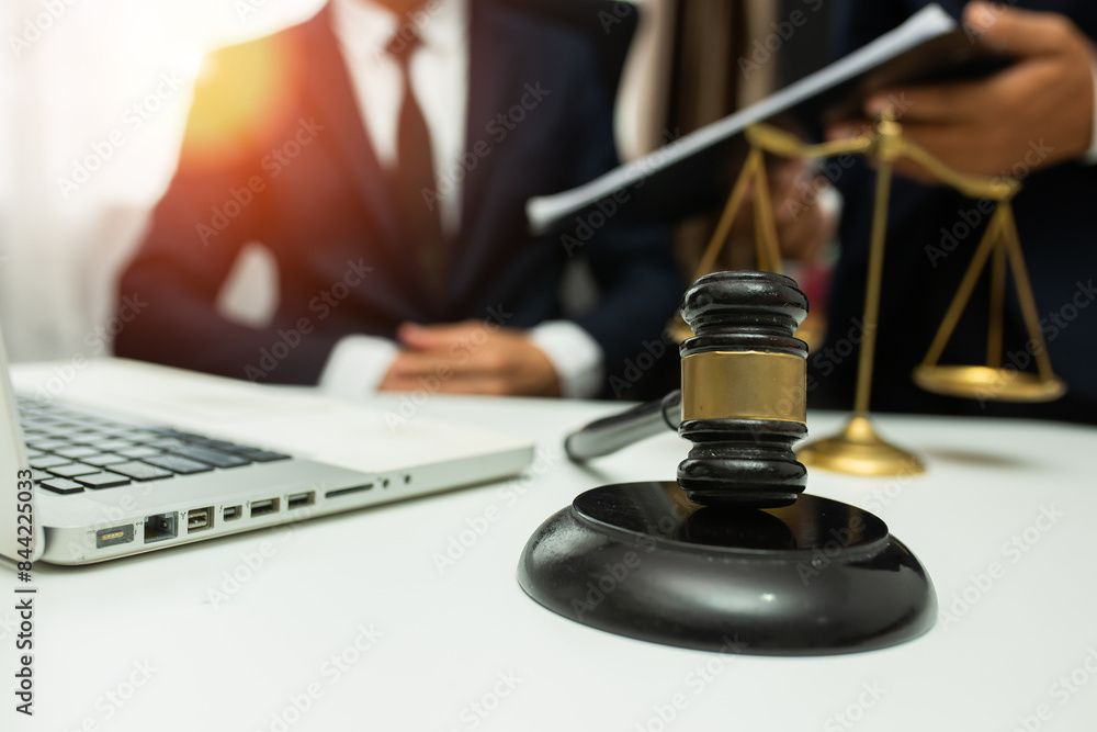 team meeting.businessman discussing legal legislation at law firm. judge gavel team meeting.businessman discussing legal legislation at law firm. judge gavel