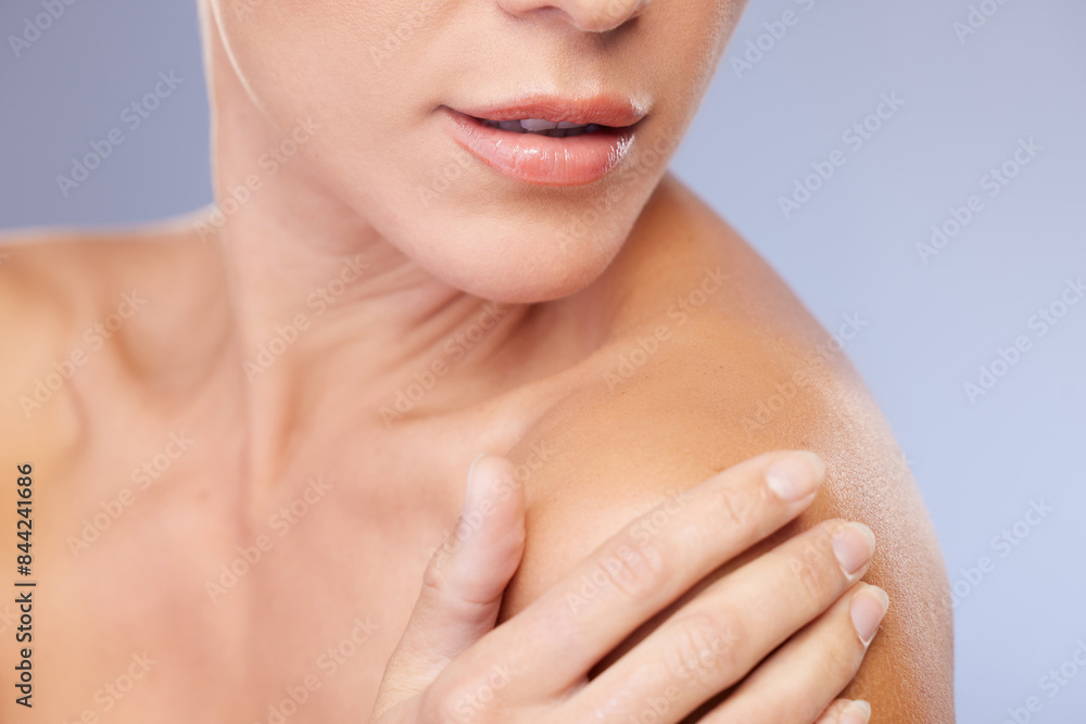 Woman, shoulder and skincare in studio for touch, soft and treatment or cosmetics on blue background. Female person, healthy and pamper for dermatology, grooming and confident for wellness or beauty Woman, shoulder and skincare in studio for touch, soft and treatment or cosmetics on blue background. Female person, healthy and pamper for dermatology, grooming and confident for wellness or beauty