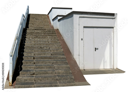 Staircase with iron railings near a stone white barn isolated