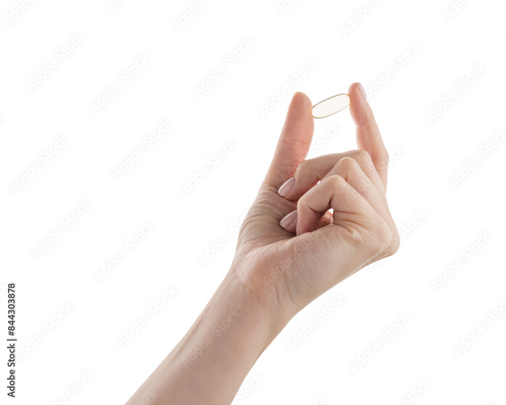 Female hand hold transparent pill isolated on white Female hand hold transparent pill isolated on white