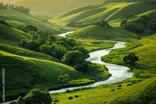 A serene countryside scene with a winding river and grazing cattle.