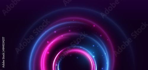 Abstract technology futuristic neon glowing blue and pink light lines with lighting effect on dark blue background.