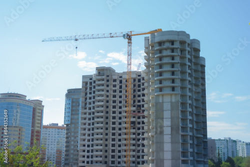 A large house under construction, a new multi-storey building