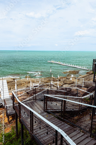 Wooden staircase leading down to a beach