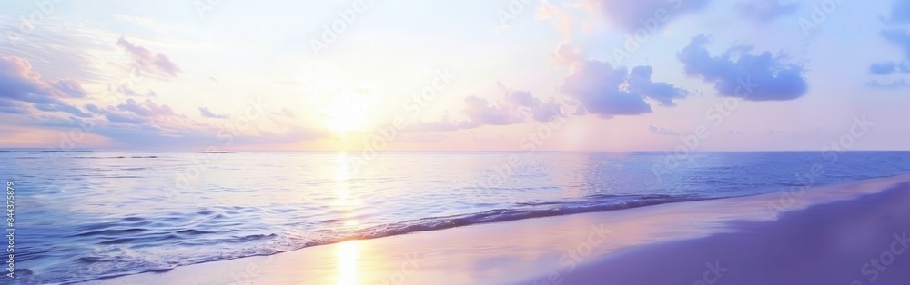 Fototapeta premium Sunset Reflecting on Calm Ocean Waters at a Beach