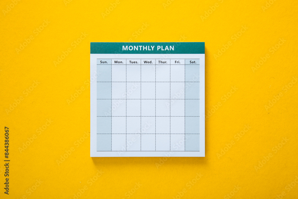 Colorful monthly planner with yellow background Colorful monthly planner with yellow background