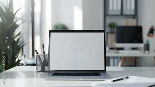 Wallpaper Mural Mockup laptop computer on working space.Open laptop and blank screen for mockup template advertising and branding technology background. Torontodigital.ca