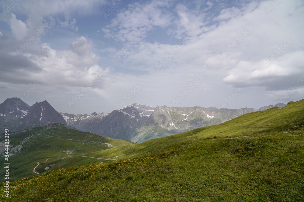 Fototapeta premium Beautiful views over the mountains with snow on the top of the mountains. The nature while hiking the Tour du Mont Blanc. 