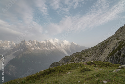 Beautiful views over the mountains with snow on the top of the mountains. The nature while hiking the Tour du Mont Blanc. 