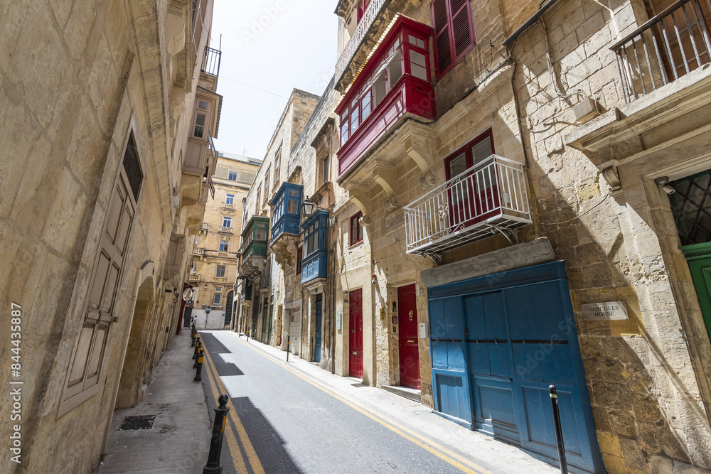 Tipical street of La Valletta with wooden terraces in Malta. Tipical street of La Valletta with wooden terraces in Malta.