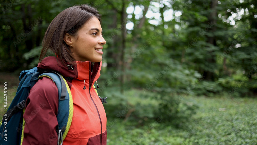 Happy girl smiling and enjoying while hiking Happy girl smiling and enjoying while hiking