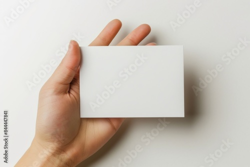 Blank White Card Mockup on Hand created with Generative AI