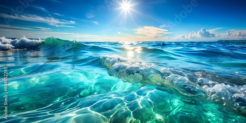 Flowing Seawater Under Light: Abstract Ocean Background. Perfect for: nature-themed designs, aquatic promotions, summer advertisements, social media posts, website backgrounds, promotional materials.