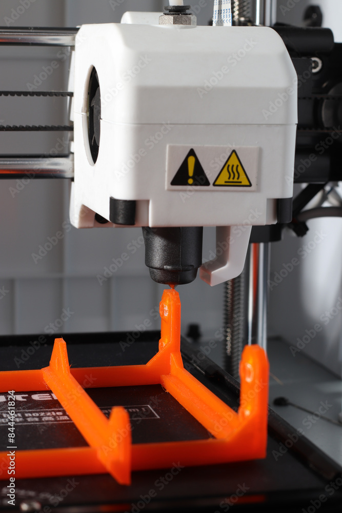 Fototapeta premium 3D Printer | orange filament object