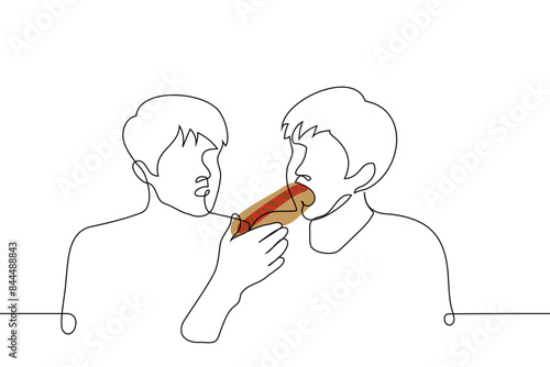 man eats a hotdog, the other watches him - one line art vector. gourmet concept, hungry satisfies hunger with fast food, envy someone else's metabolism