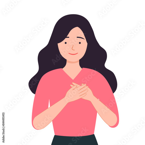 Woman keeps hands on chest, feels thankful gratitude.