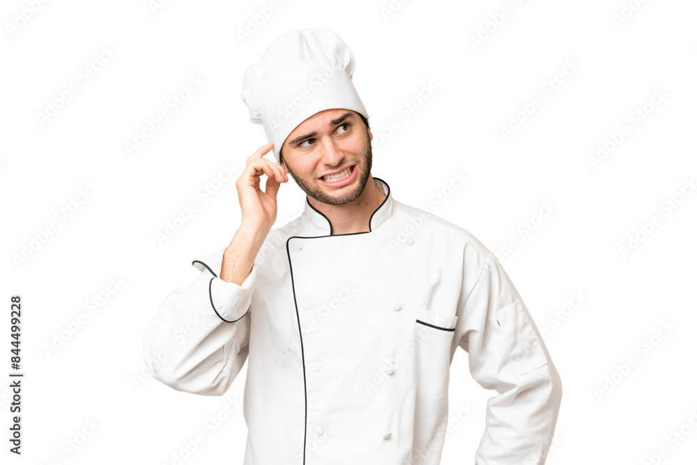 Young handsome chef man over isolated background having doubts and with confuse face expression