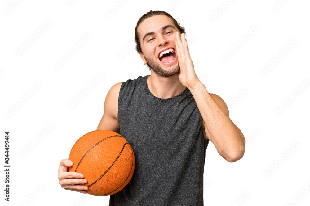 Young basketball player man over isolated background shouting with mouth wide open Young basketball player man over isolated background shouting with mouth wide open