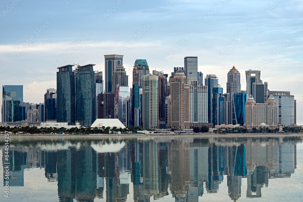Fototapeta premium The Panoramic skyline of Doha, Qatar during sunset sunrise