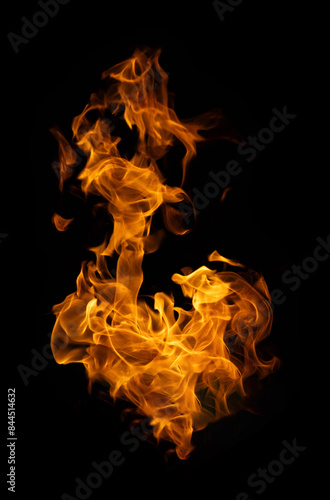 Fire and burning flame of explosive fireball isolated on dark background for abstract graphic design concept
