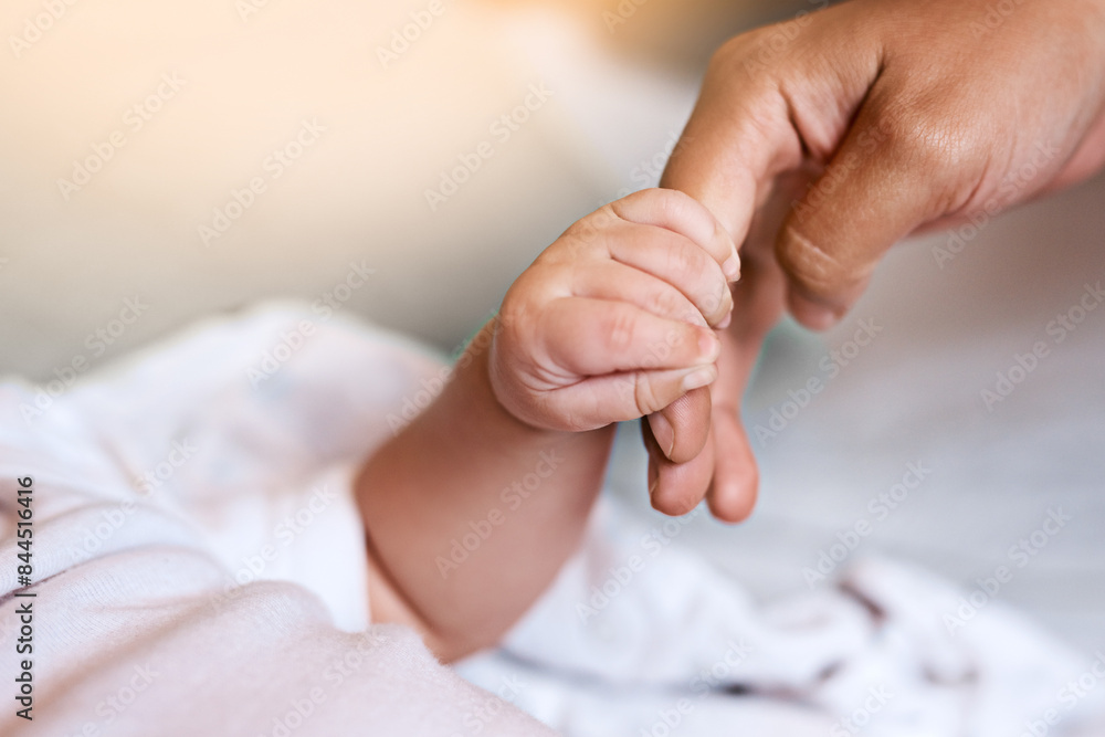 Newborn, hands and holding fingers with person in house, wellness and affection together for family bonding with baby. Bedroom, parent and relax with infant for care, childhood and growth with love Newborn, hands and holding fingers with person in house, wellness and affection together for family bonding with baby. Bedroom, parent and relax with infant for care, childhood and growth with love